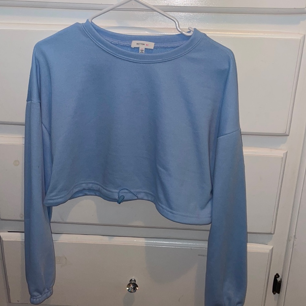Baby blue classic crew neck cropped top. Size - M. Adjustable waste cropped top